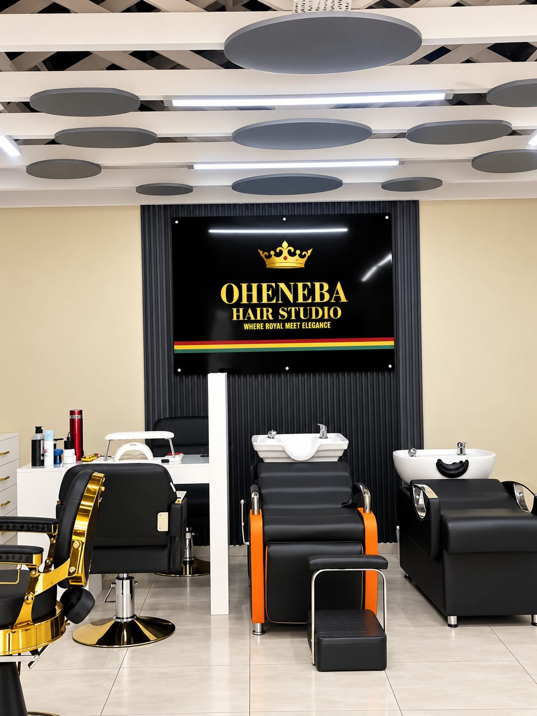 Wash stations and the Oheneba sign inside the studio